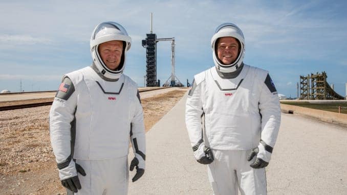 NASA astronauts Douglas Hurley (L) and Robert Behnken pose while participating in a dress rehearsal for launch at the agency's Kennedy Space Center ahead of NASA's SpaceX Demo-2 mission to the International Space Station in Cape Canaveral, Florida, U.S. M